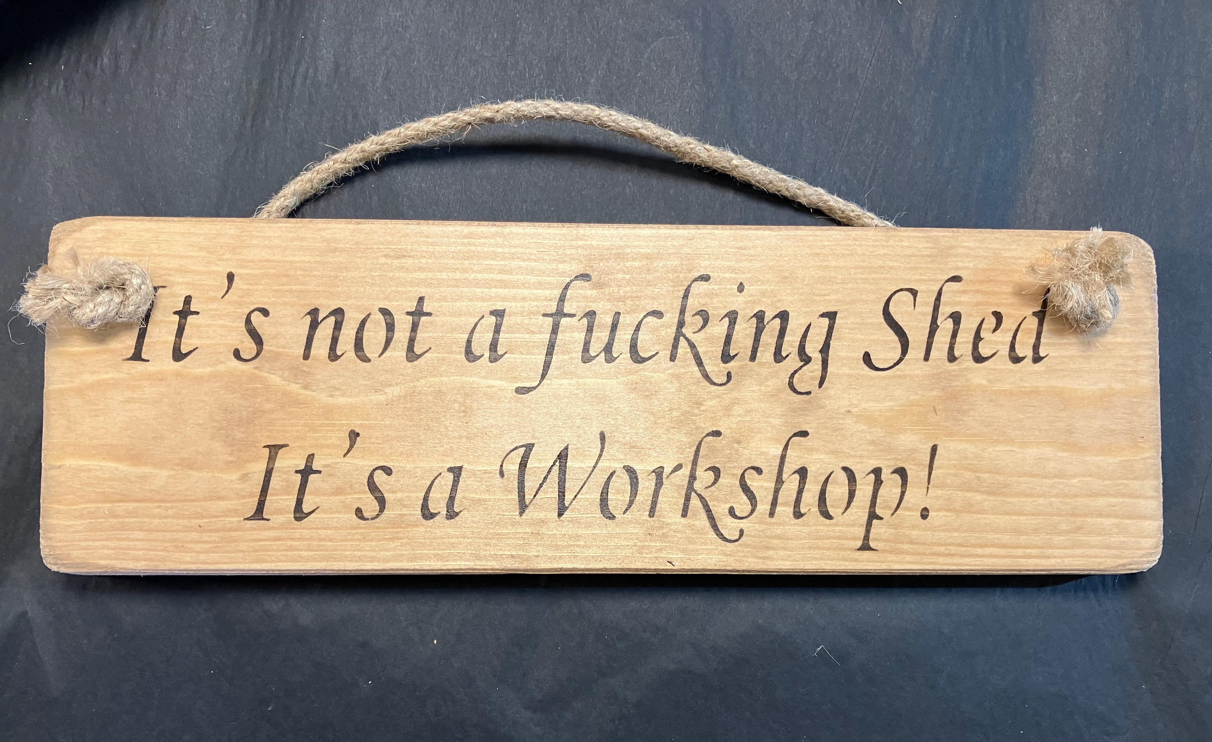 Its not a shed it’s a workshop wooden roped sign