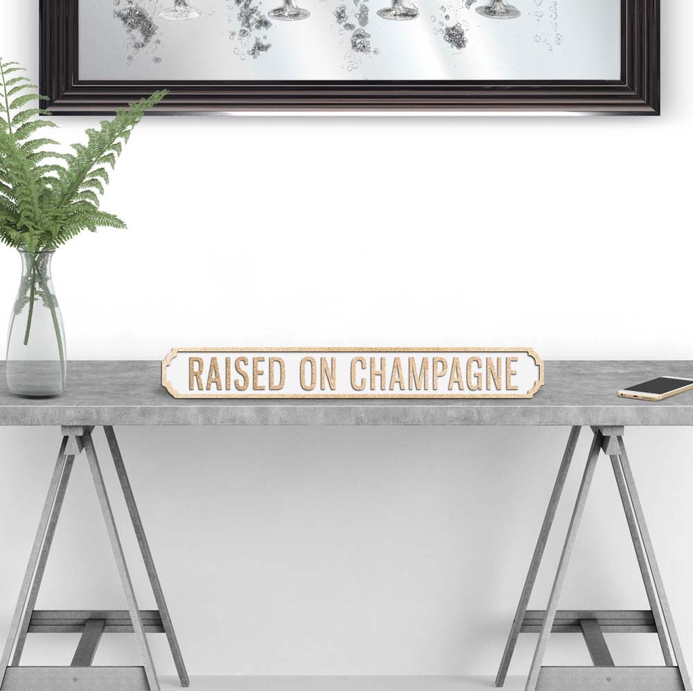 Raised on Champagne Wooden street road sign
