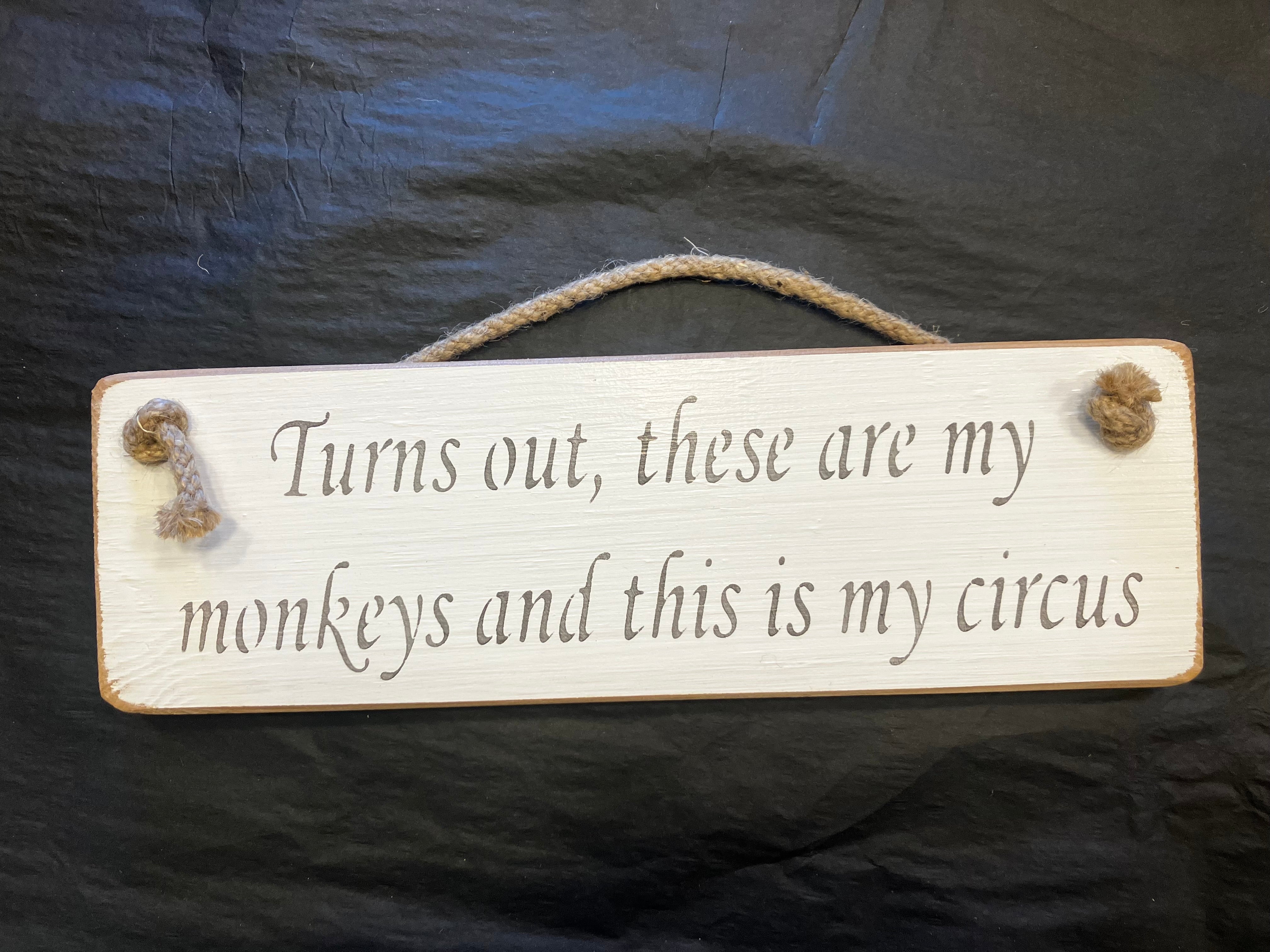 Wooden sign monkeys circus 