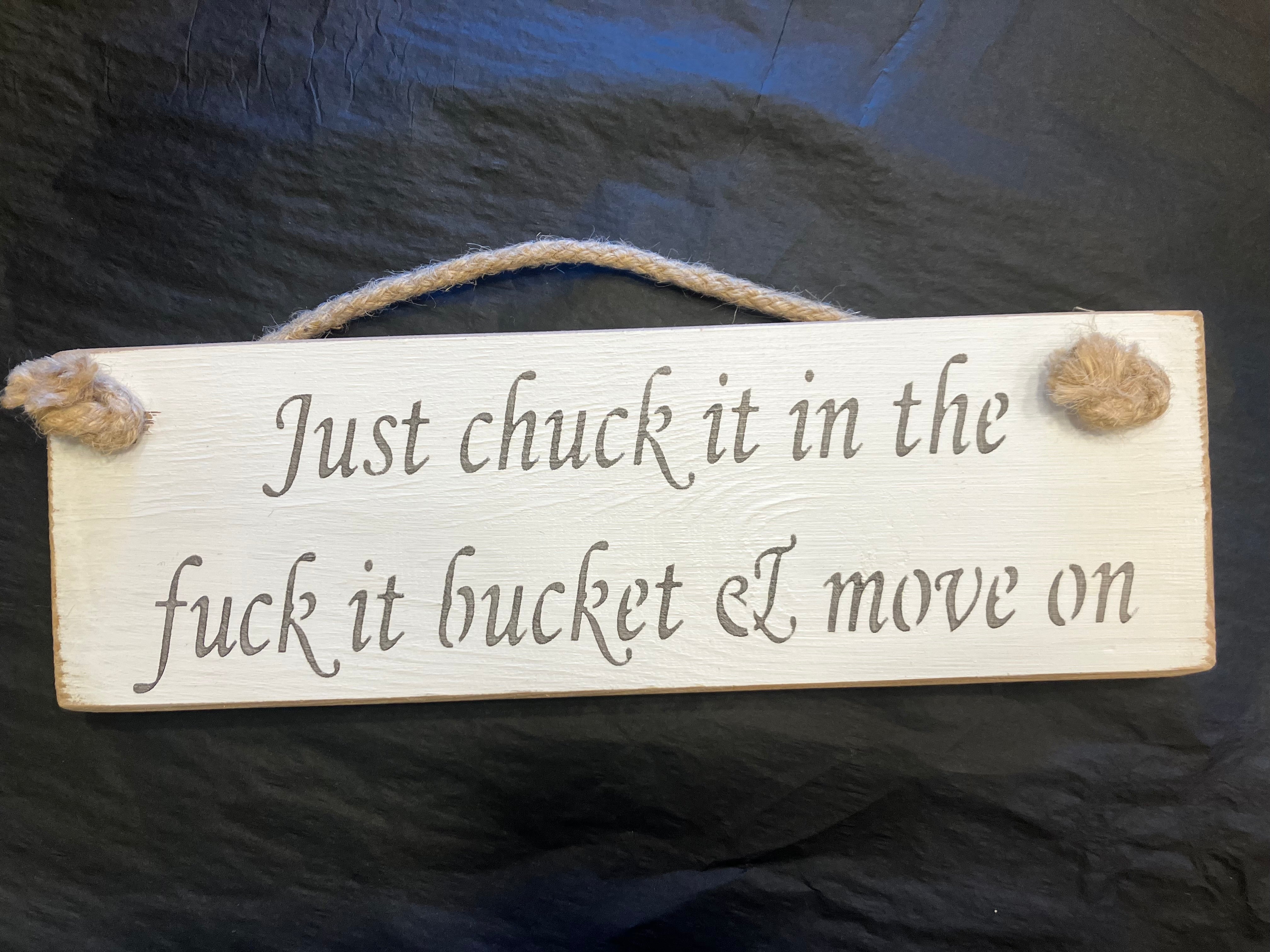 Wooden sign swearing move on