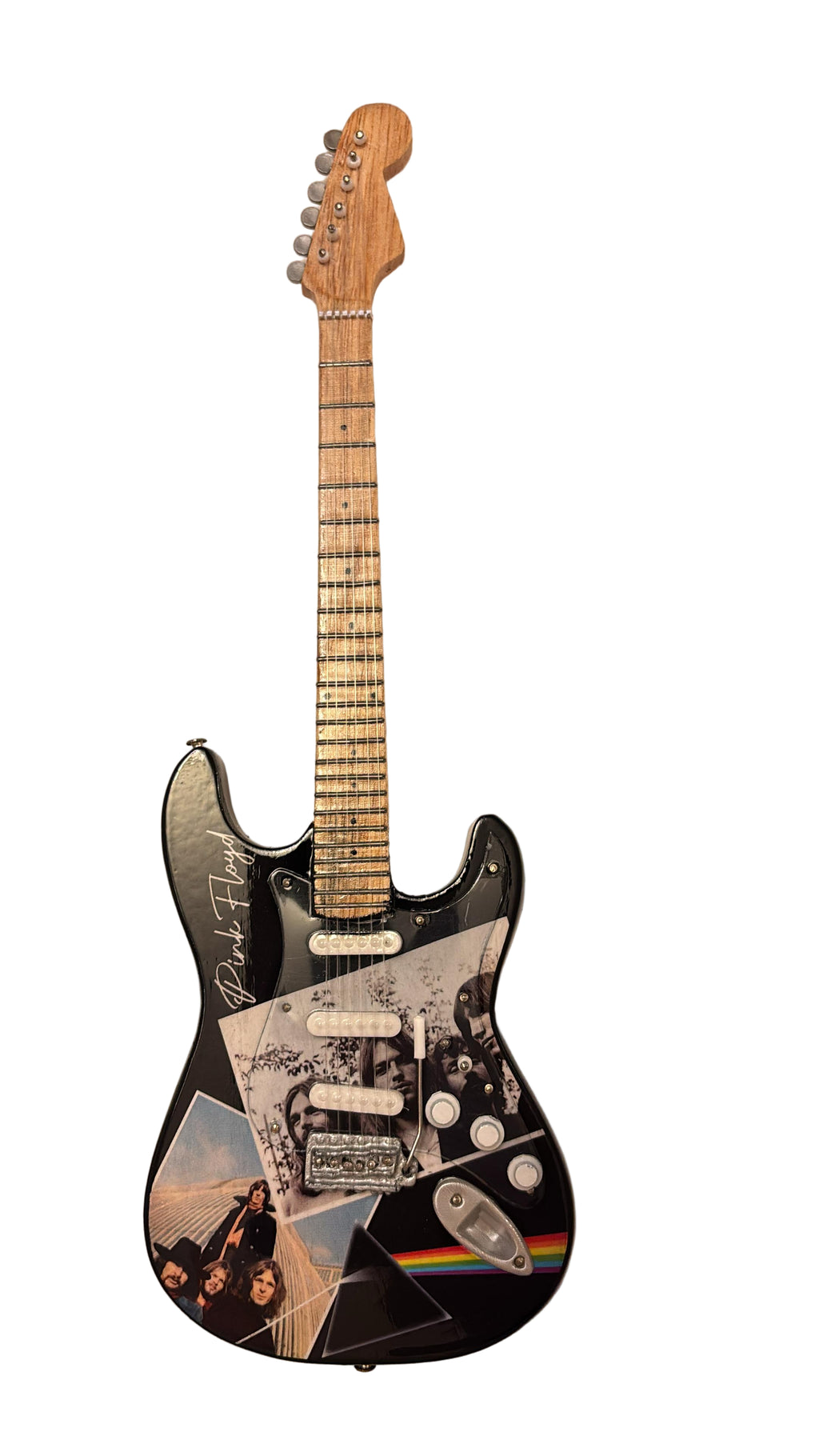 PINK FLOYD Fender Stratocaster guitar with a unique design in a box on a wooden surface