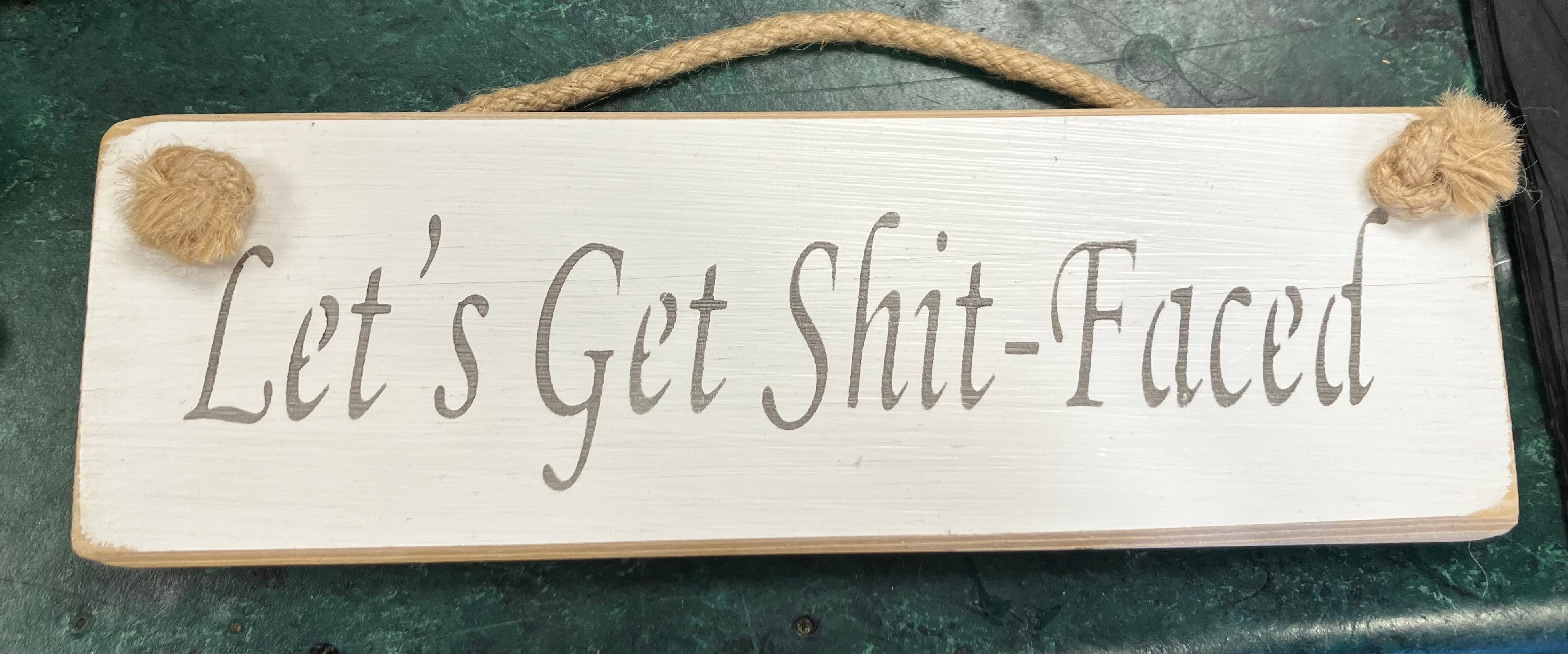 Wooden sign rude drinking