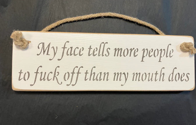 Wooden sign rude go away