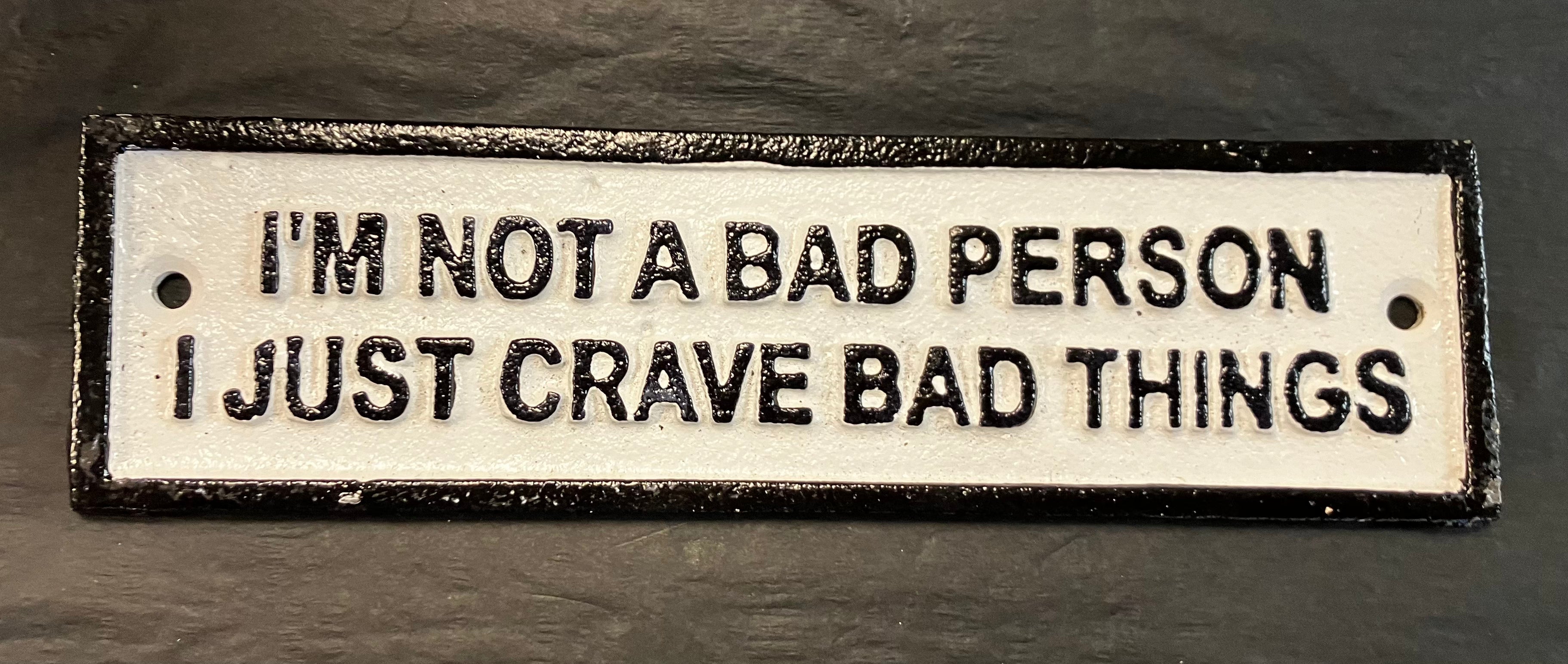 Crave bad things wall sign