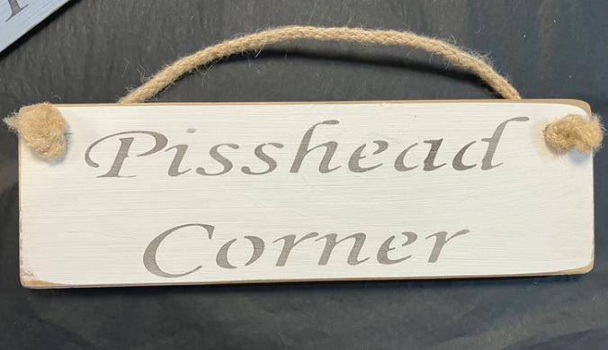 Wooden sign drinking corner