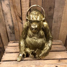 Gold Gorilla wearing headphones figure ornament