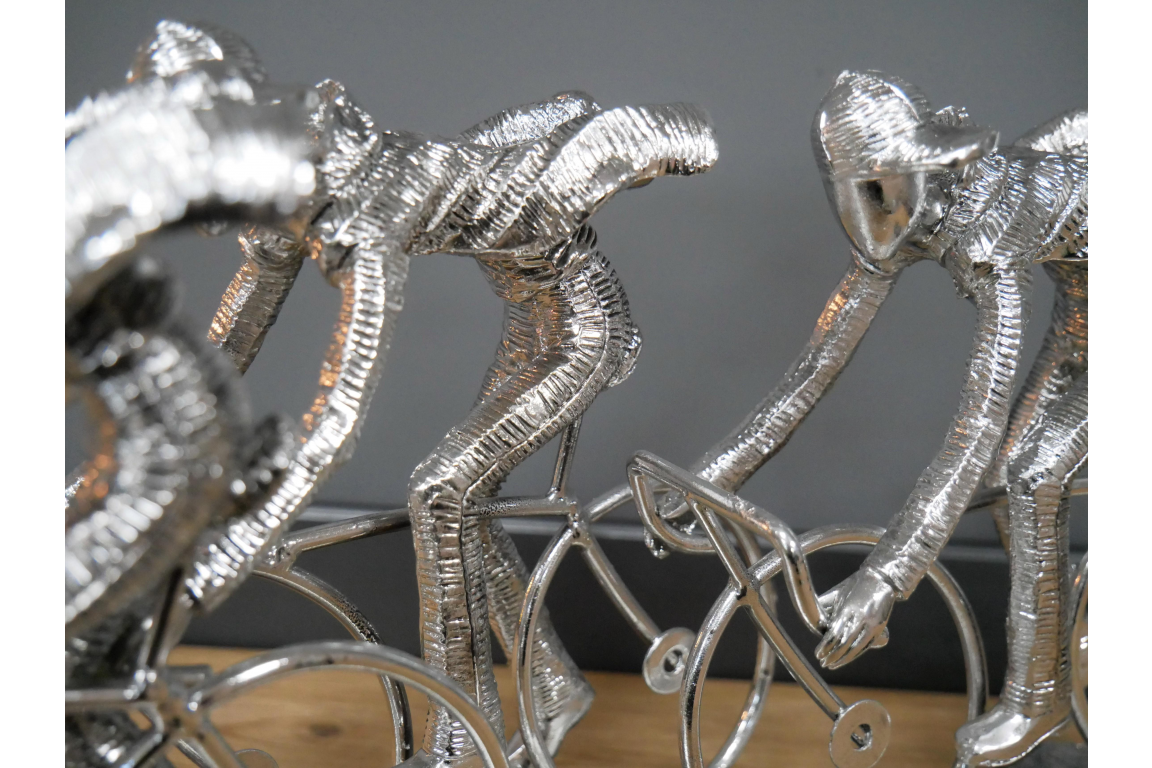 Silver cycling sculpture