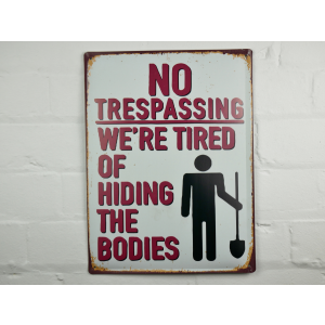 No trespassing were tired of burying the bodies metal sign