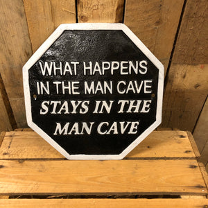 What happens in the Man cave heavy cast iron sign
