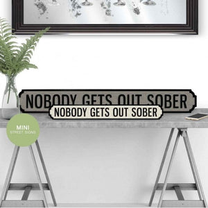 nobody gets out sober street sign
