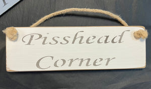 Pisshead Corner wooden roped sign