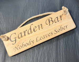 Garden Bar Nobody leaves sober wooden roped sign