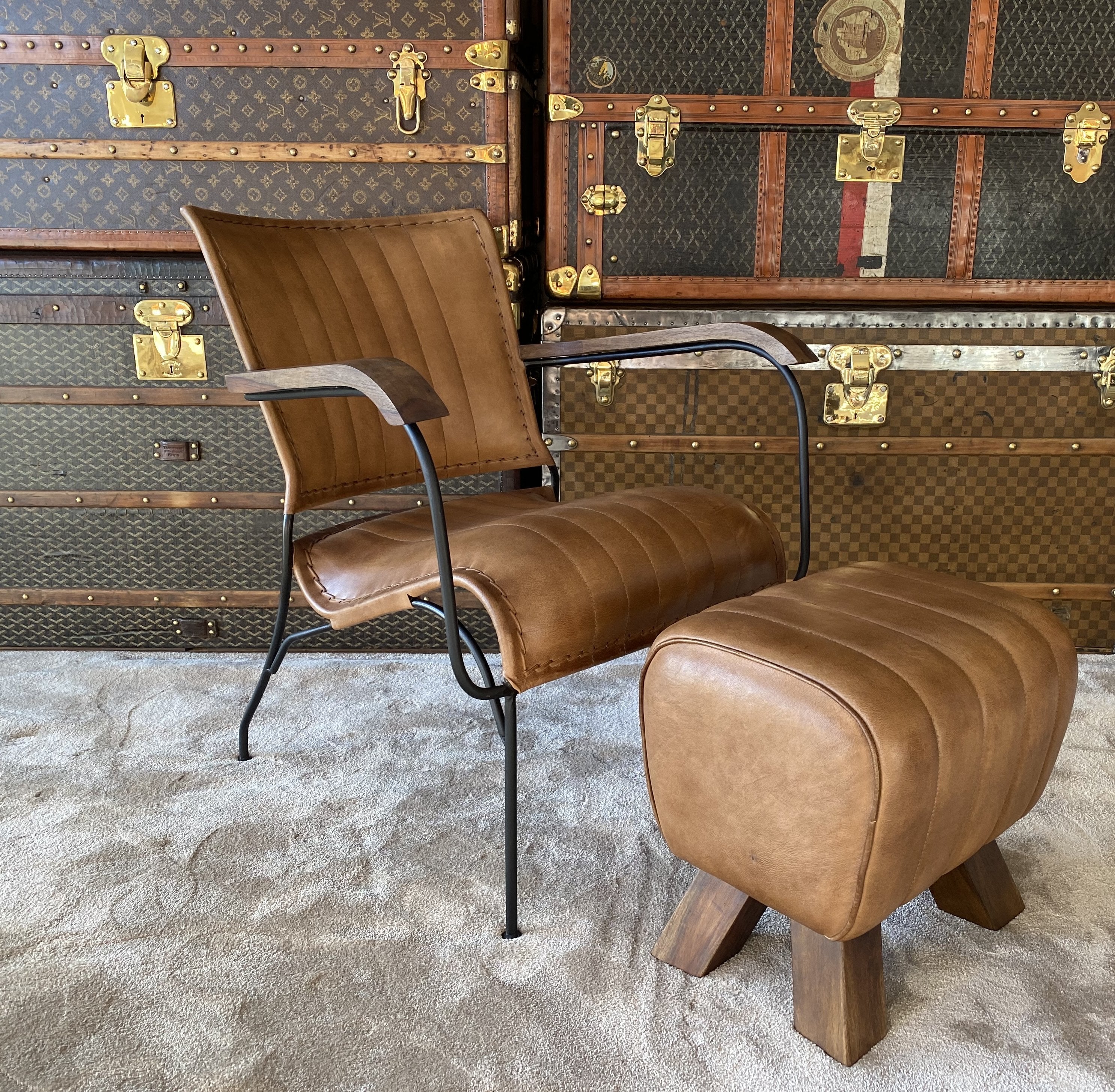 Ribbed leather chair with matching footstool