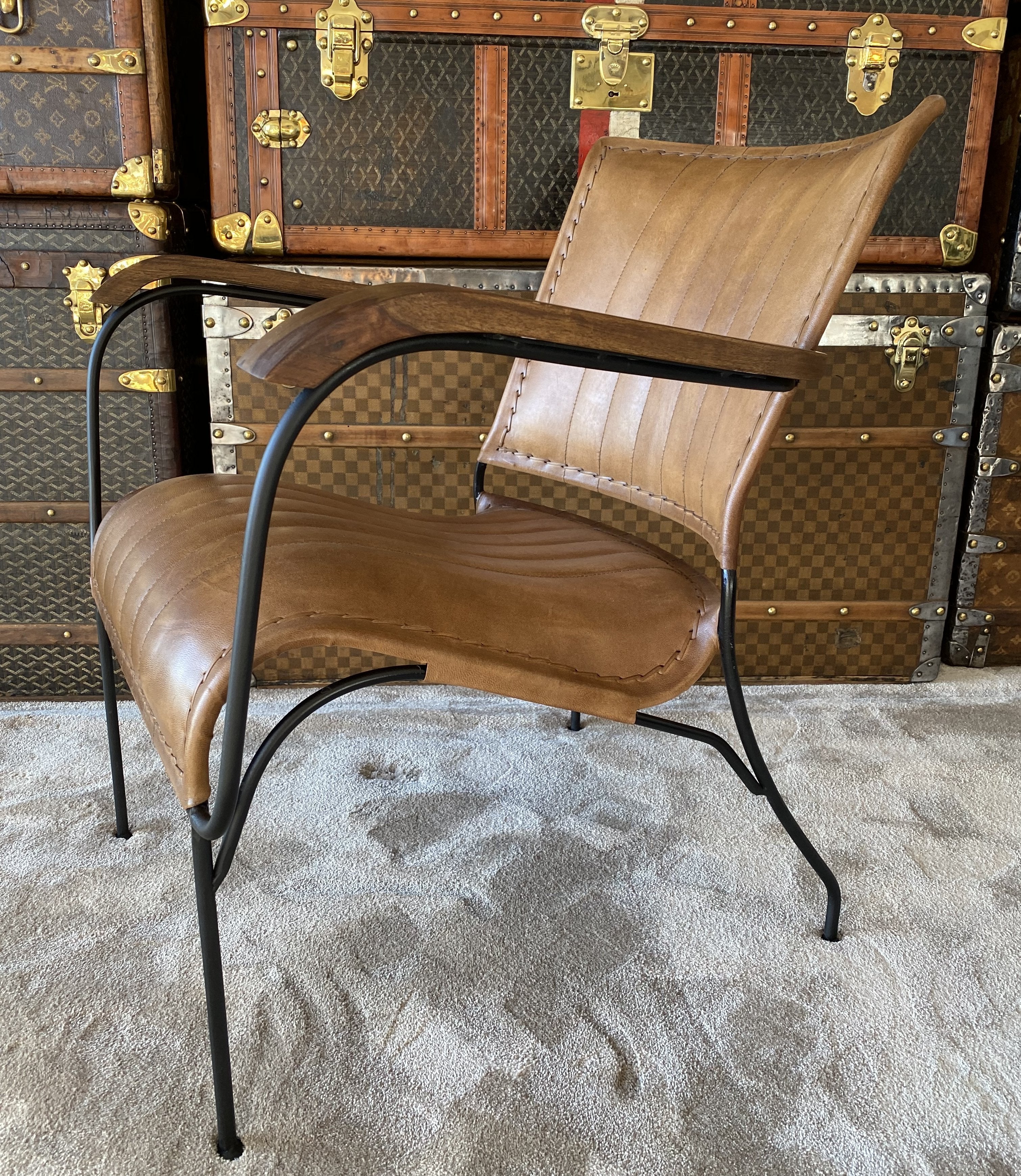 Brown leather arm chair from side